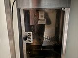 a machine that has some food inside of it