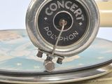 a small tin with a clock on top of it