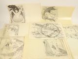 a lot of drawings that are on the table