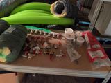a table with a bunch of hoses and other items on it