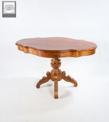 Table d'appoint en bois de forme violonée ouvrant par deux t…