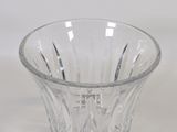 a glass vase that is sitting on a table