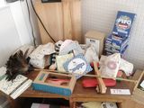 a wooden table with a lot of items on it