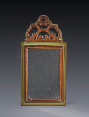 an old wooden frame with a mirror in the middle of it