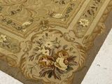 a rug with flowers on it on the floor