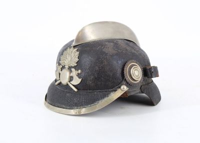 a helmet with a maple leaf on it on a white surface