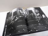 a black and white photo of an open book
