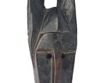 an image of a wooden sculpture of a horse ' s head on a white background