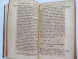 an open book with a picture of a man on it