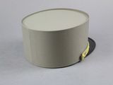 a white top hat with a yellow ribbon around it