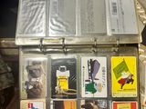 a suitcase full of cards sitting on top of a table