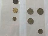 a lot of coins that are in a plastic bag