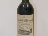a bottle of wine that is sitting on a table