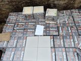 a lot of boxes of cigarettes on the ground