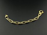 an image of a gold chain link necklace on a black background