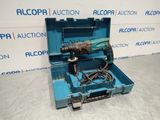 a blue tool box with a drill and a cord in it