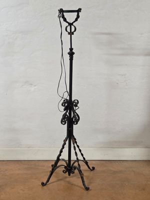 an image of a lamp that is on a stand in a room