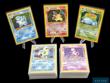 four different pokemon cards are displayed on a black background