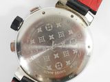 an image of a close up of a wrist watch on a white surface