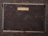 a picture of a wooden frame with a sign on it