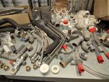 a lot of pipes and fittings on a table