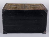 an old black box with gold trims and a lid