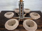 a wooden table with a candle holder on it