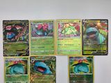 un ensemble de cartes Pokémon accrochées au mur d'une pièce