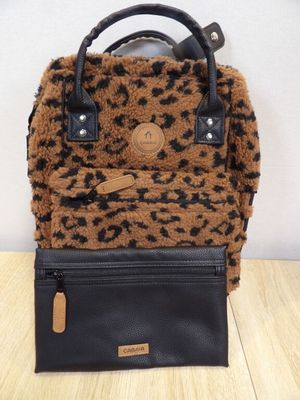 a brown and black leopard print purse with a black leather handle