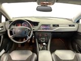 the interior of a car with a steering wheel, dashboard, and dash board