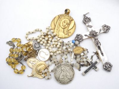 a lot of religious items that are on a table