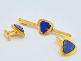 two pairs of lapis and gold cufflinks with lapis stones