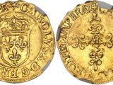 a gold coin with a coat of arms on it