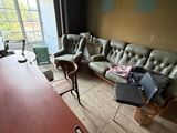 an image of a living room with a couch and a table