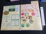 a book with stamps on it sitting on a table