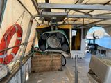 an image of a boat with a lot of equipment on the deck