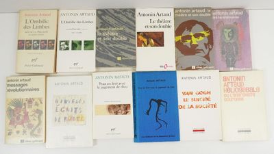 several books on a white table with a white background