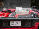 a tool box with tools in it on the back of a truck