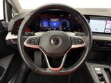 the interior of a car with a steering wheel and dashboard controls