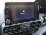 a picture of a car dashboard with a tablet on it