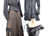 two dresses on a mannequin stand and a dress on a mannequin stand