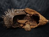 an image of a baseball glove with spikes on it