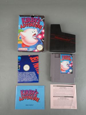 un gros plan sur un jeu Nintendo posé sur une table