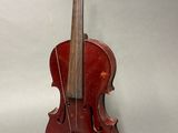 an old violin is sitting on a table with a white background