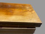 a piece of wood that is sitting on top of a table