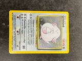 a close up of a pokemon card on a table