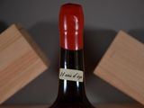 a bottle of wine that is sitting on a table