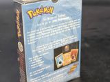 a box of pokemon cards sitting on a table