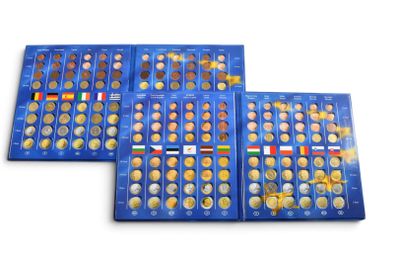a set of three blue trays filled with different coins