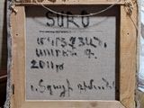 a picture of a picture of someone writing on a piece of fabric